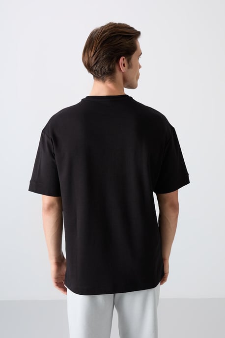 Översized T-shirt i bomullsblandning med rund hals keur - Image 5