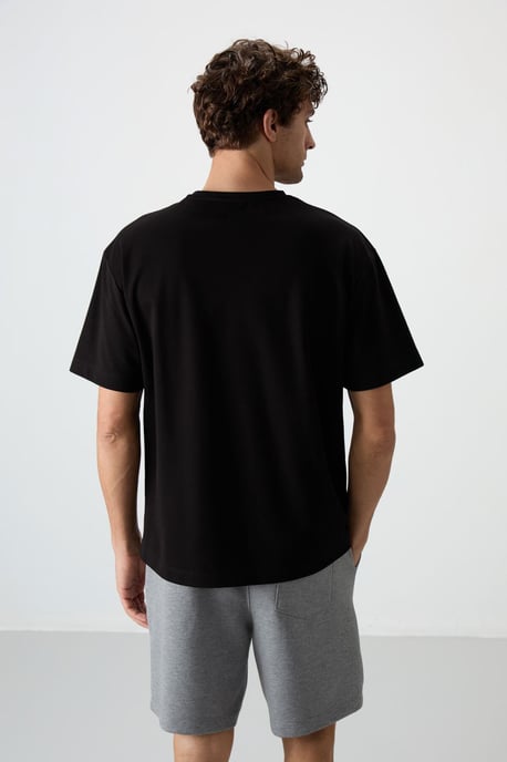 Överdimensionerad T-shirt med crewneck och tryck - Image 5