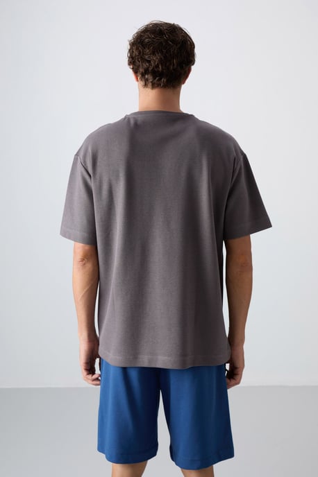 Oversized T-shirt i bomullsblandning med rund halsringning och ficka - Image 5