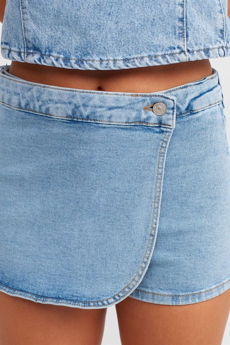Högmidjad denim minikjol - Image 4