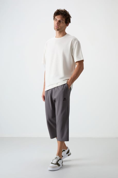 Heren Mid-waist Wijde Capri Shorts - Image 1
