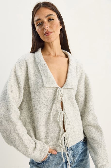 Oversized V-ringad kofta med knytning och ribbad struktur - Image 4