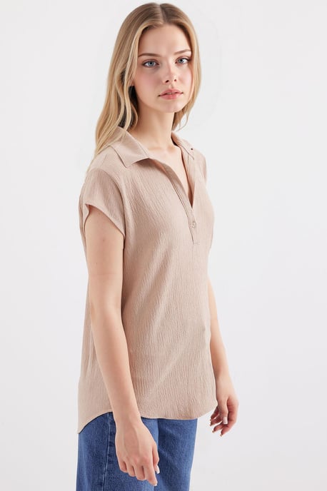 Texturerad polotröja blus med knäppning - Image 2