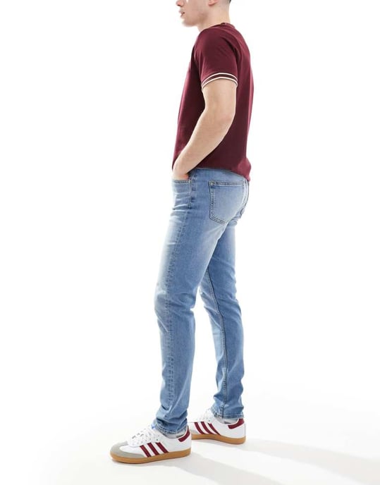ASOS DESIGN skinny jeans in mid wash blue - Image 2