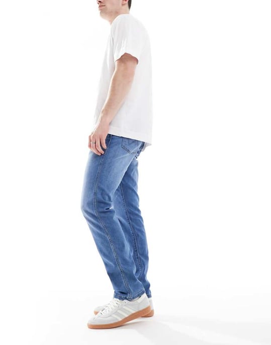 Wrangler Larston slim tapered fit jeans in mid wash blue - Image 2