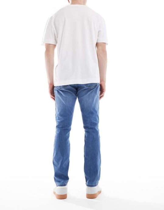 Wrangler Larston slim tapered fit jeans in mid wash blue - Image 3