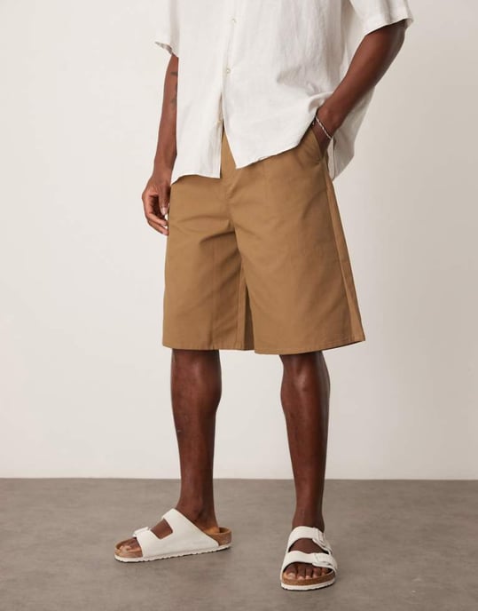 ASOS DESIGN long length pleated shorts in tan - Image 1