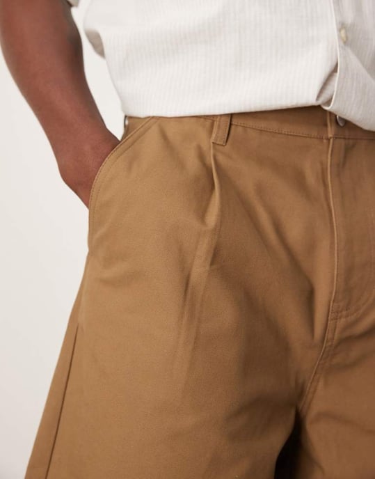 ASOS DESIGN long length pleated shorts in tan - Image 3