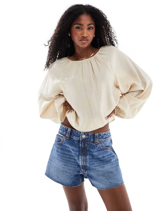 ASOS DESIGN denim relaxed short in midwash blue - Image 1