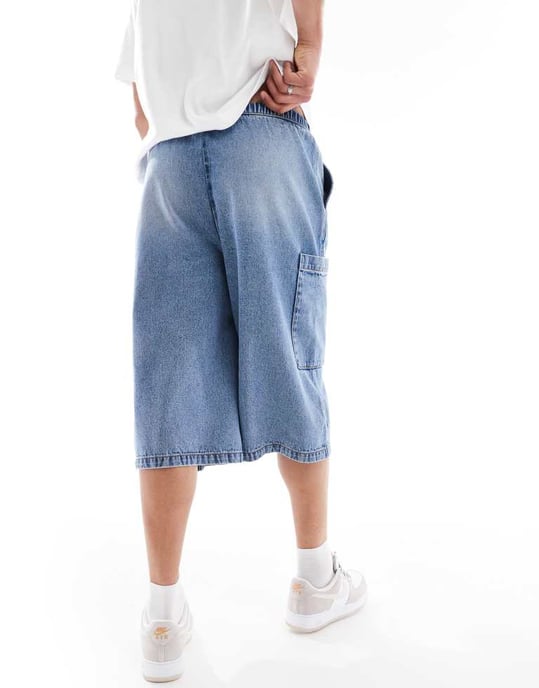 ASOS DESIGN longer length denim jort in mid wash blue with cargo pocket details - Image 4