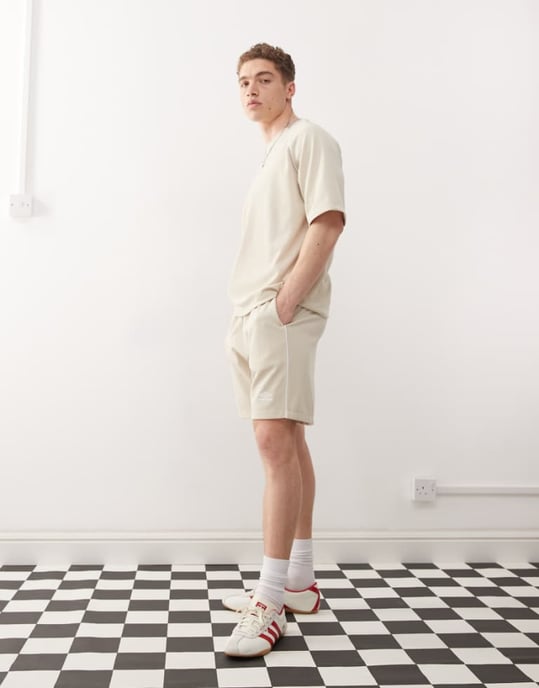 Umbro panelled mesh shorts in beige - Image 1