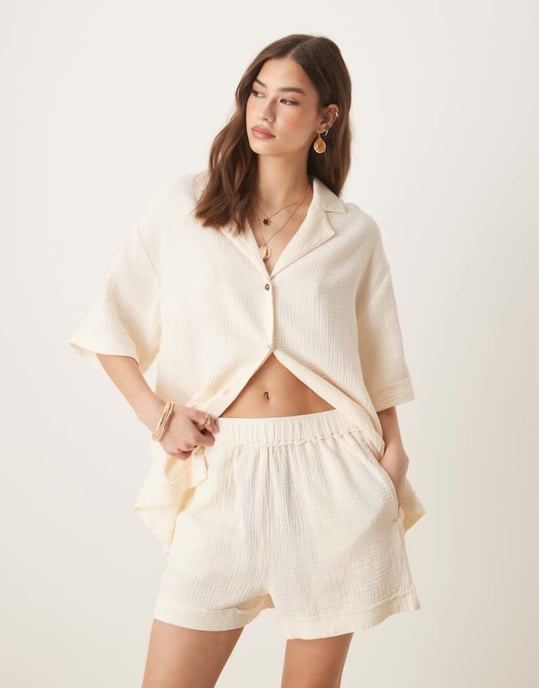 ASOS DESIGN cheesecloth pull on shorts with raw edge detail co-ord in buttermilk - Image 1
