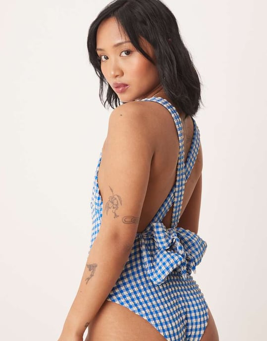 ASOS DESIGN Petite seersucker scoop swimsuit with giant bow back detail in blue gingham - Image 2
