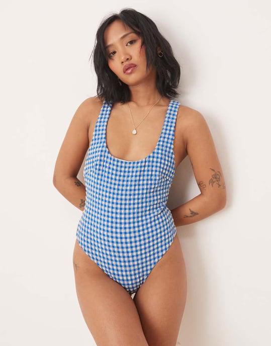 ASOS DESIGN Petite seersucker scoop swimsuit with giant bow back detail in blue gingham - Image 3