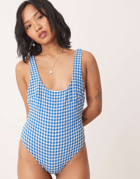 ASOS DESIGN Petite seersucker scoop swimsuit with giant bow back detail in blue gingham - Image 4