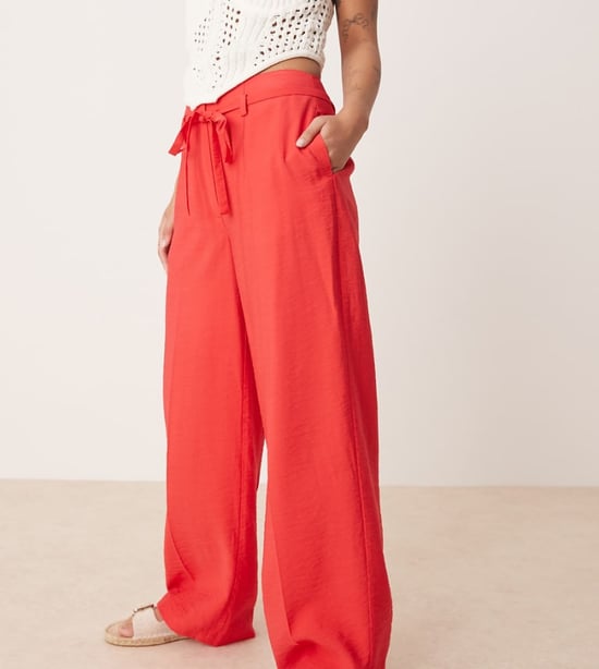 ASOS DESIGN Petite tailored wide leg trousers co-ord with tie belt in red - Image 1