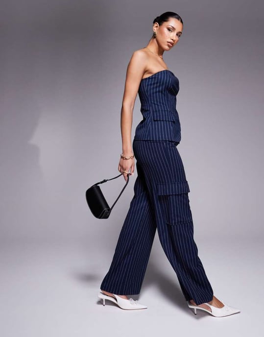 In The Style x Natalya Wright exclusive tailored wide leg pocket detail trousers co-ord in navy pinstripe - Image 1