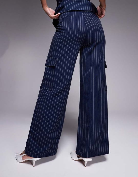 In The Style x Natalya Wright exclusive tailored wide leg pocket detail trousers co-ord in navy pinstripe - Image 4