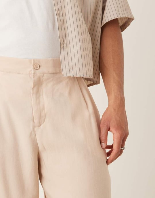 ASOS DESIGN oversized tapered smart trousers in beige - Image 4