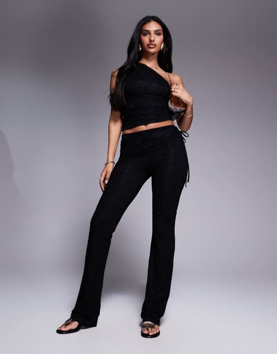 Kaiia exclusive double layered slinky belt detail lace trouser co-ord in black - Image 1