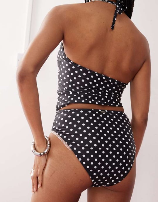 Reclaimed Vintage high waist bikini bottom with frilly trim in black polka dot print - Image 3