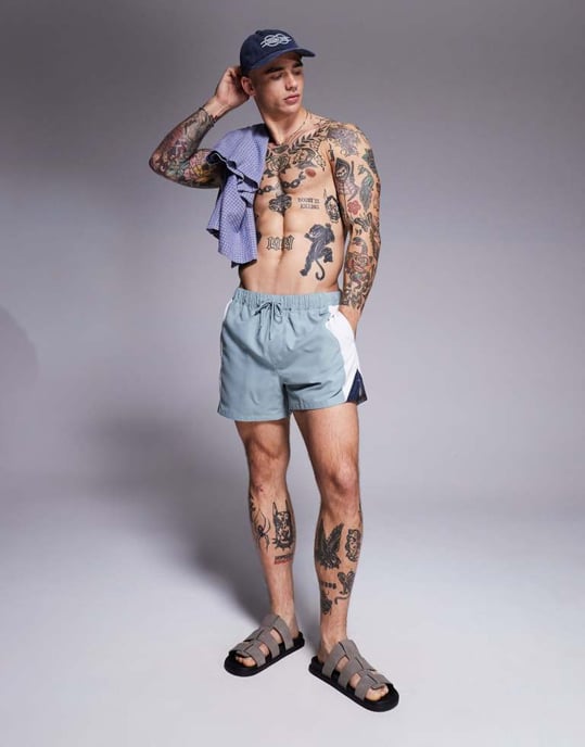 ASOS DESIGN swim shorts in short length with side vent cut and sew in blue - Image 3