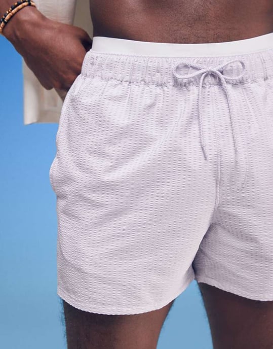 ASOS DESIGN seersucker swim shorts in short length in purple - Image 3