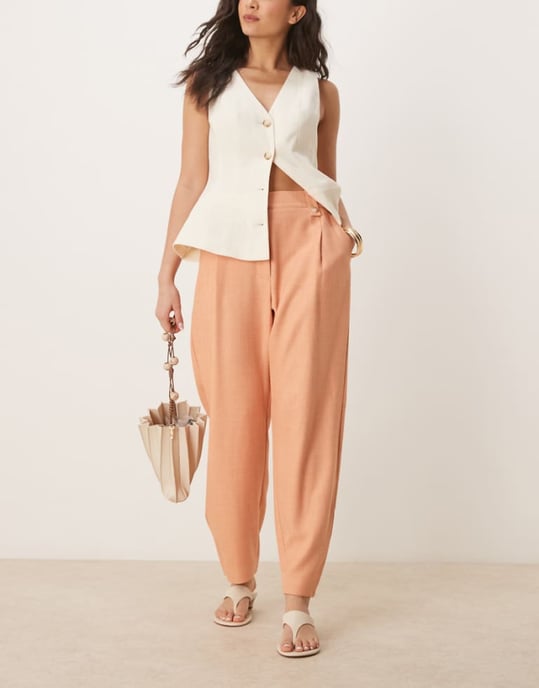 ASOS DESIGN tailored textured barrel trousers with tab detail in apricot - Image 1