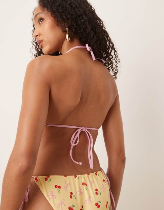 ASOS DESIGN Brielle fluga och körsbärstrykt snörning bikiniunderdel i gult - Image 4