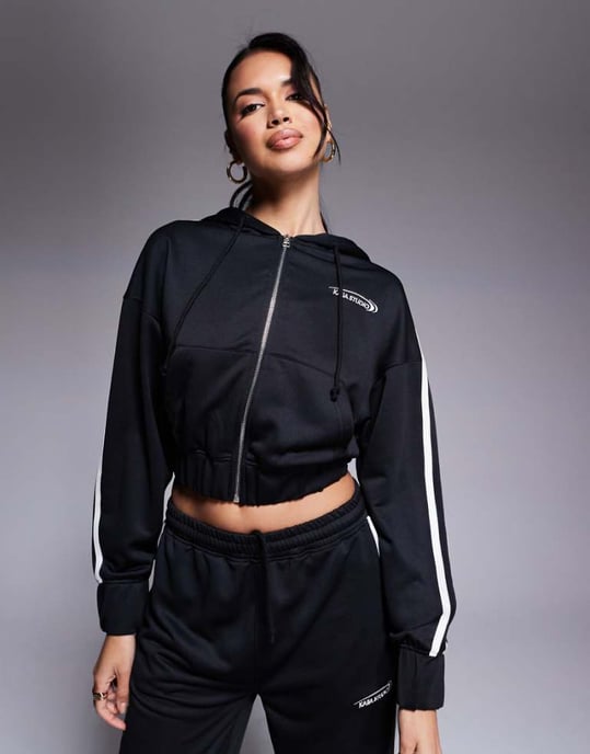 Kaiia cotton blend Studio cropped side stripe zip up hoodie co-ord in black - Image 1