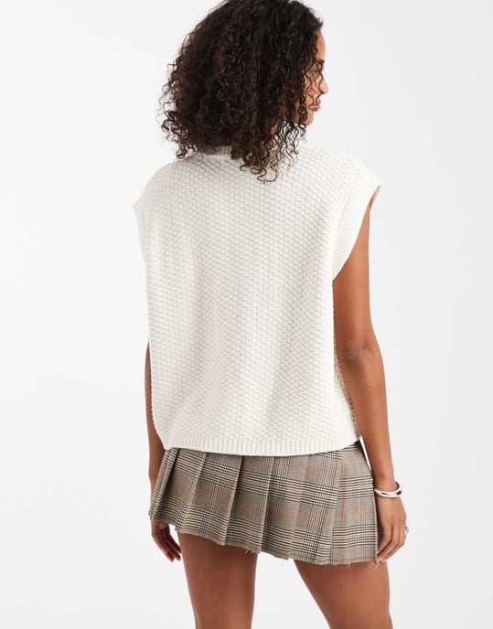 ASOS DESIGN boxy knitted stitch waistcoat with button detail in cream - Image 2