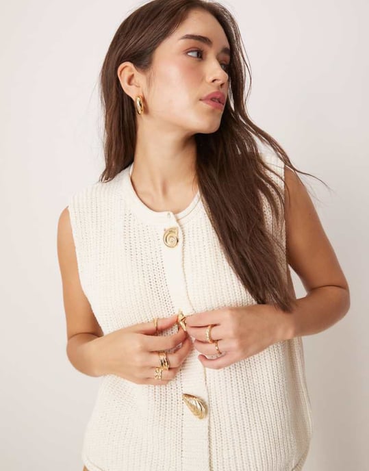 ASOS DESIGN knitted boxy waistcoat with multi shell buttons in white - Image 1