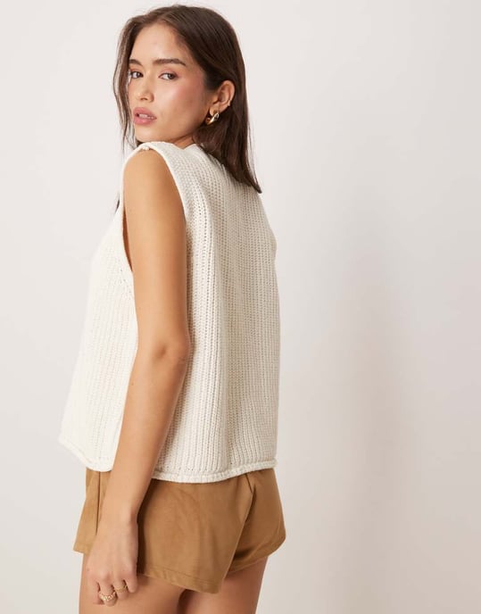 ASOS DESIGN knitted boxy waistcoat with multi shell buttons in white - Image 4