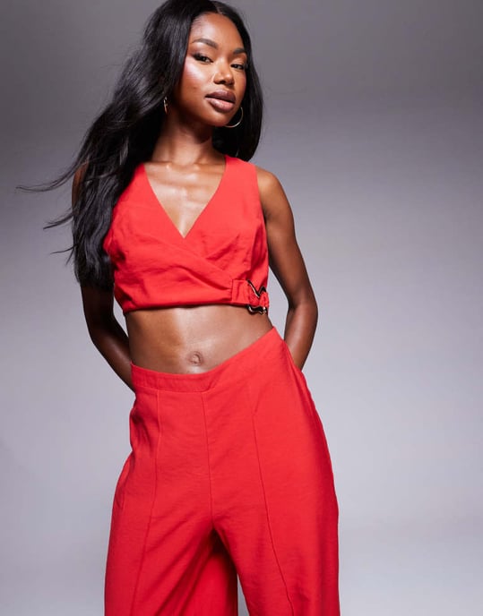 ASOS DESIGN wrap front cut out jumpsuit with buckle detail in red - Image 2