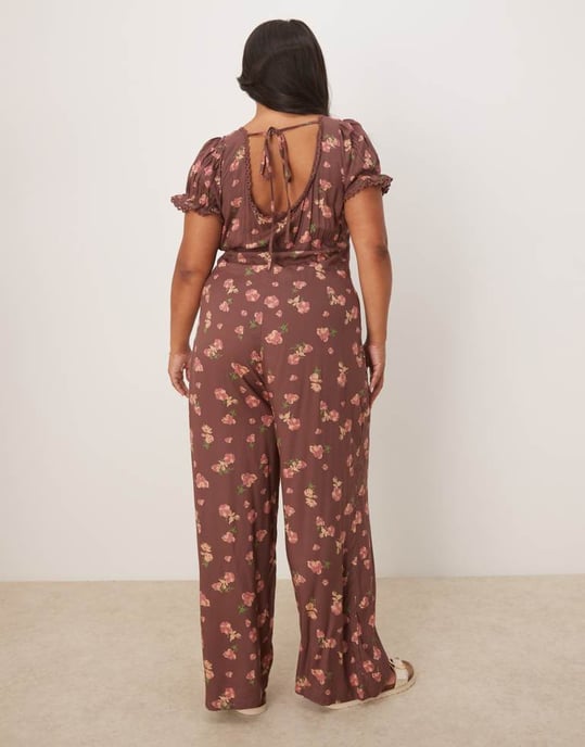 ASOS DESIGN Curve spun lace trim corset waist jumpsuit in mauve floral print - Image 3