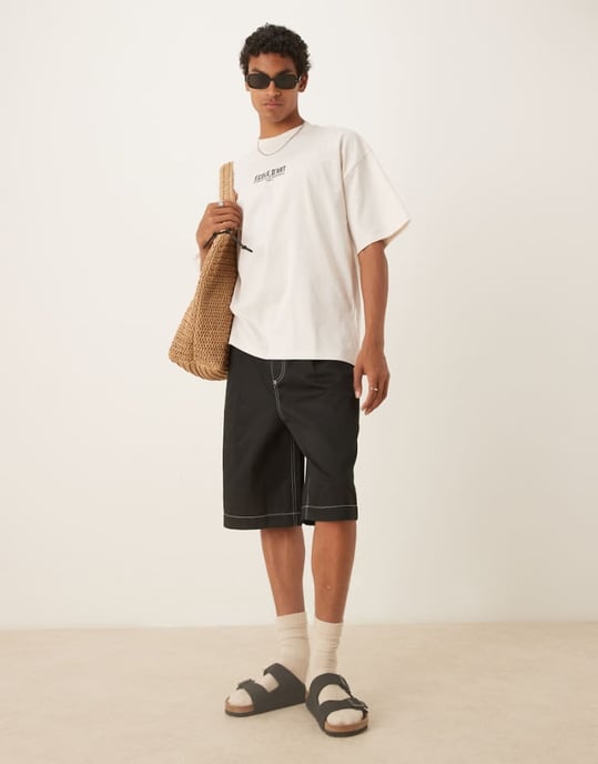 ASOS DESIGN oversized baggy plisserade shorts i svart - Image 1