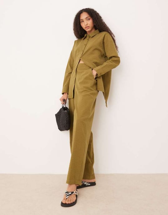 ASOS DESIGN seersucker relaxed pull on stripe trousers co-ord in olive - Image 1