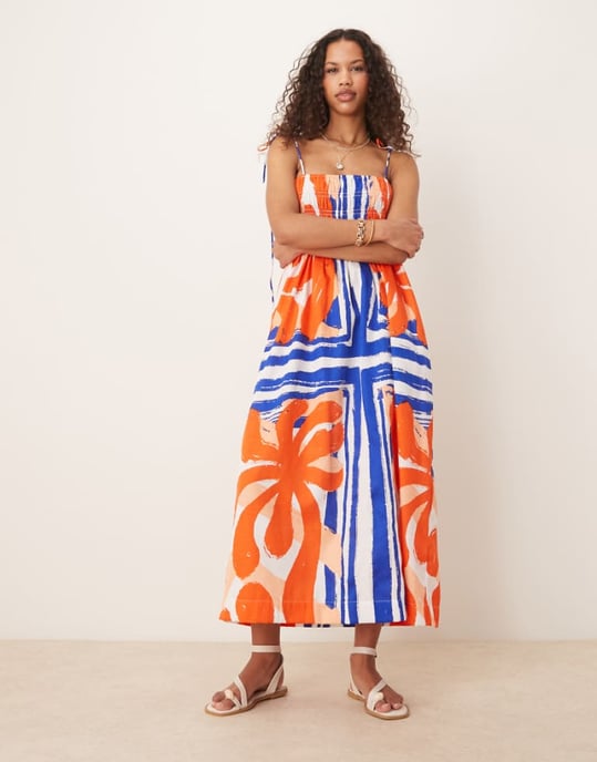 ASOS DESIGN shirred bust cotton sateen maxi dress in red and blue abstract print - Image 1