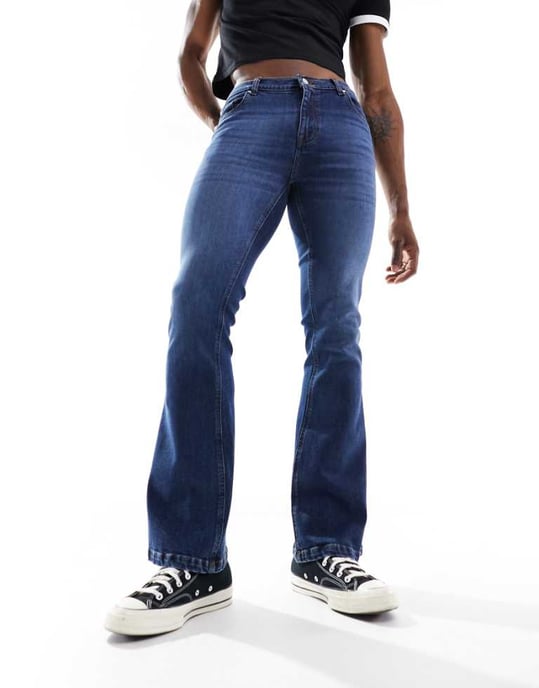 ASOS DESIGN stretch flare jeans in dark wash blue - Image 1