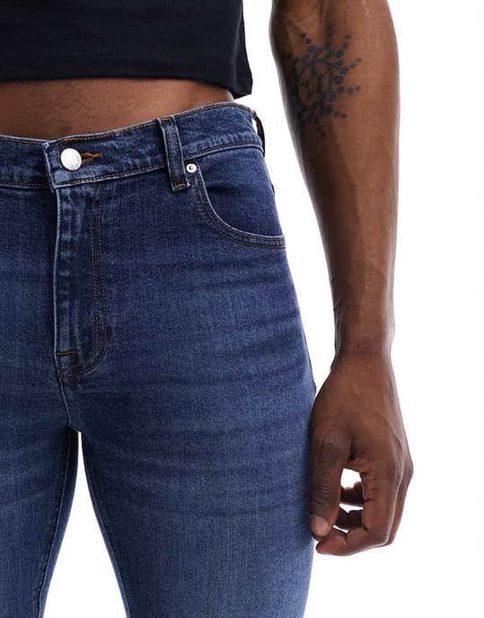 ASOS DESIGN stretch flare jeans in dark wash blue - Image 4