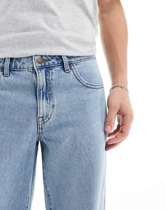 ASOS DESIGN wide flared jeans in mid wash blue - Image 2
