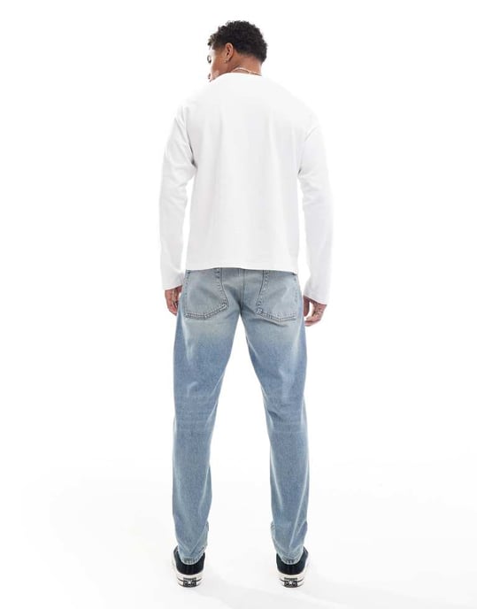 ASOS DESIGN tapered jeans i medtvättad blå nyans - Image 2