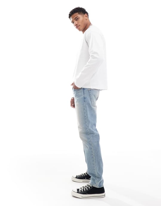 ASOS DESIGN tapered jeans i medtvättad blå nyans - Image 3