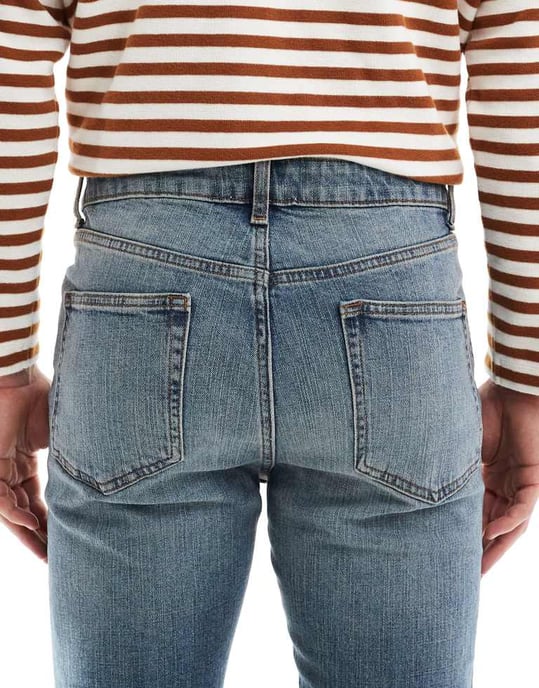 ASOS DESIGN skinny jeans in mid wash blue - Image 4