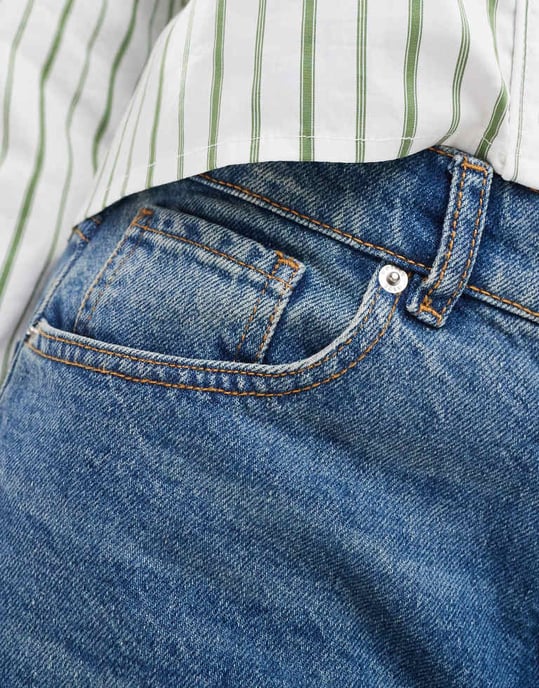 ASOS DESIGN baggy longline denim jorts in midwash blue - Image 2