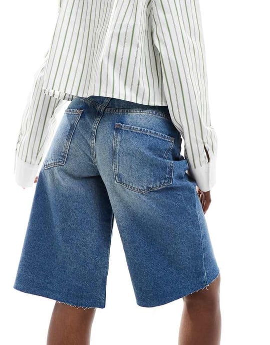 ASOS DESIGN baggy longline denim jorts in midwash blue - Image 3