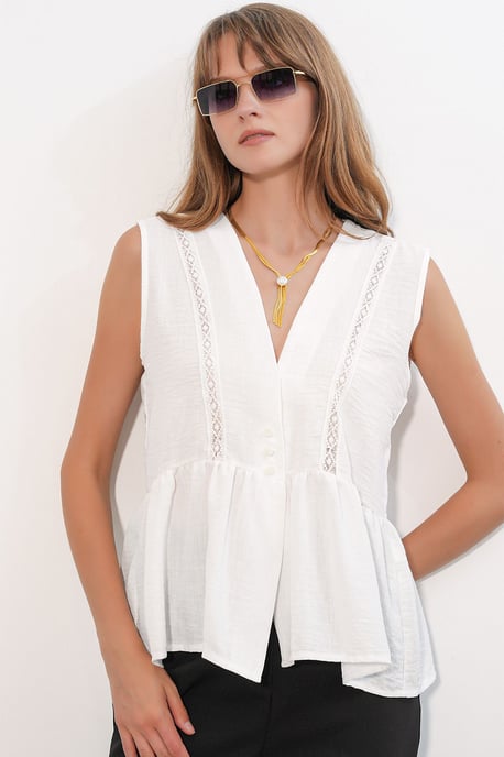 ÄSleeveless V-ringad Blus med Knäppning Fram - Image 1