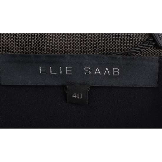 Elie Saab mini-jurk met lange mouwen en kanten details, in gelaagde stijl, uitgevoerd in zwart polyamide. - Image 4