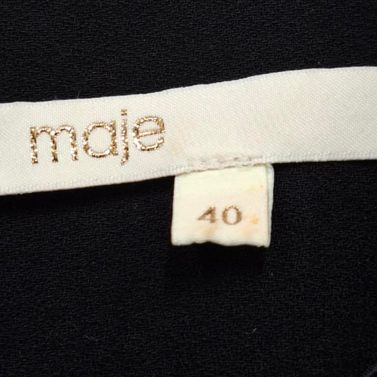 Maje jumpsuit met V-hals en strikceintuur in zwart acetaat. - Image 3