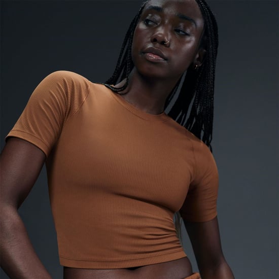 Women's Nike Zenvy Rib Top in Tan/White - Image 1